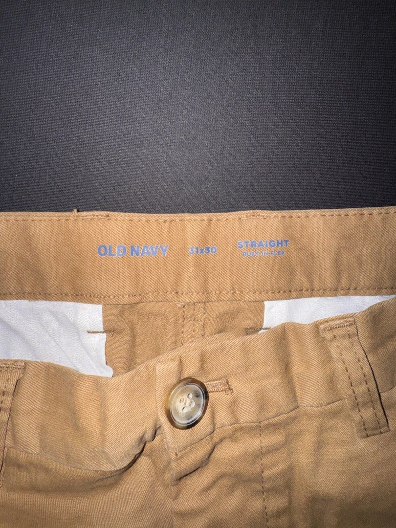 Old Navy Straight Built-In Flex Khakis 31x30 (Category: Chinos) located in Taguig. Submitted by crossmill23 (Listing ID 1446328706, Image 2). Description: - Old Navy Khaki Pants - Straight Fit - Built-In Flex for enhanced comfort - Size: 31 Waist, 30 Inseam - Classic khaki color, easy to pair with any outfit - Suitable for casual and smart casual occasions - Features button and zip closure - RFS: Outgrown.