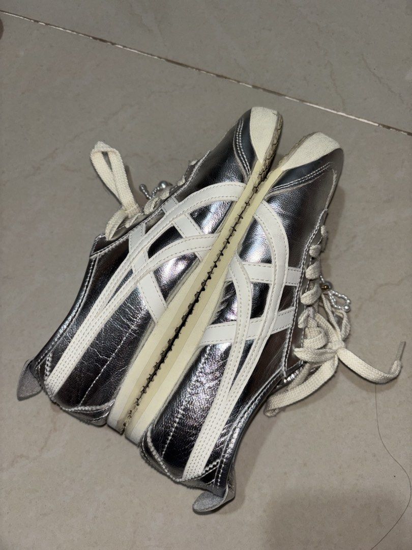 Onitsuka Tiger Mexico 66 Silver Off White (Category: Sneakers) located in Manila. Submitted by declutterwithbeyuh (Listing ID 1446172826, Image 2). Description: - Stylish silver Onitsuka Tiger sneakers - Adorned with charming pearl lace accessories - Ideal for everyday casual wear - Size: 23cm - kasya to size US5.5- 6!! .