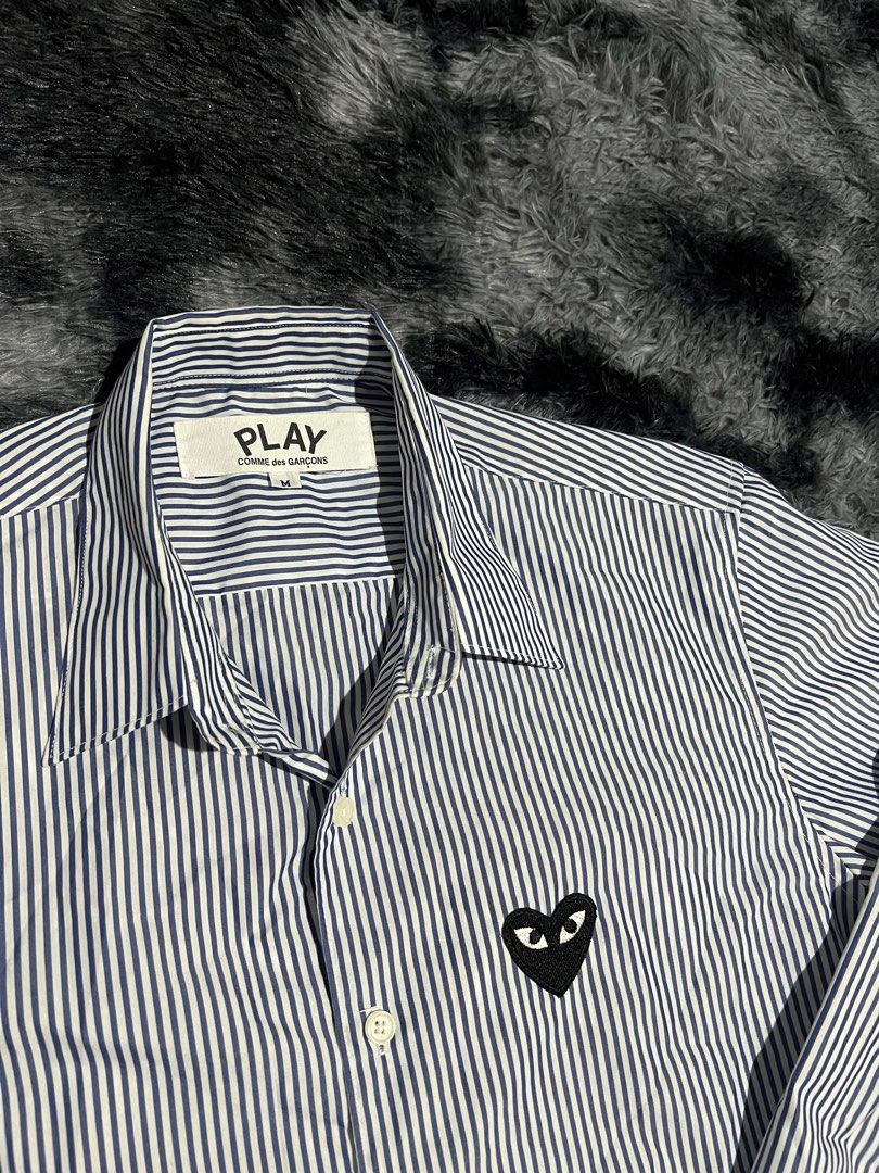 CDG Play buttons down polo (Category: Tshirts & Polo Shirts ) located in Cebu City. Submitted by drip_block (Listing ID 1446216288, Image 2). Description: Dimes:19x20 Color rate:9.5/10 Condition: 9/10 Condition: 9/10 E Can ship nationwide 6 . Courier: J&T express/Maxim & MOP: cash/gcash “ LAPU LAPU CITY, CEBU VDF/SF will be shoulder by the buyer.