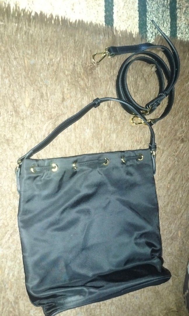 PRADA DRAWSTRING 🧿🧿🧿 (Category: Luxury Bags & Wallets) located in Baguio. Submitted by gracialowxury_bags (Listing ID 1446276422, Image 2). Description: EXCELLENT CONDITION...NOT GUARANTEED AUTHENTIC...HIGH QUALITY 👌 MEDIUM SIZE 🧿🧿🧿.