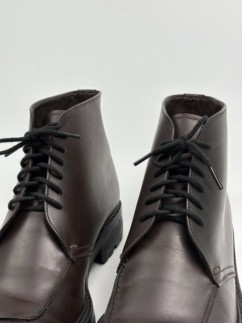 Prada Square Toe Leather Derby Boots (Category: Boots) located in Cavite. Submitted by sc_rcity (Listing ID 1446285816, Image 3). Description: Tagged Size : 9 Men’s | 27cm Insole Authentic Like New Color : Burgundy Minimal sign of wear , Scratches No major flaw Made in Italy No Inclusion Features an apron-toe stitch detail on a smooth leather upper.Built with a chunky, rugged lug outsole for a contemporary look..