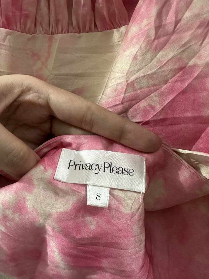 Privacy Please Pink Tie Dye Halter Top Size S (Category: Sleeveless) located in Quezon City. Submitted by shop.theclutter (Listing ID 1446178243, Image 3). Description: - Cute pink and white tie dye halter top - Brand: Privacy Please - Ruched detailing on bodice and sleeves - Ties at neck - Ideal for night outs or vacations.