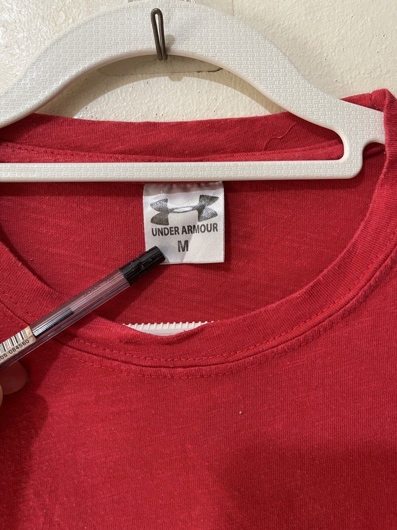 Red Under Armour T-Shirt Size M (Category: Tshirts & Polo Shirts ) located in Cebu City. Submitted by gemmarshall (Listing ID 1446331147, Image 3). Description: - Classic red Under Armour t-shirt - Features iconic UA logo on the front - Crew neck, short sleeves - Comfortable fabric - Size Medium - Ideal for workouts or casual wear.