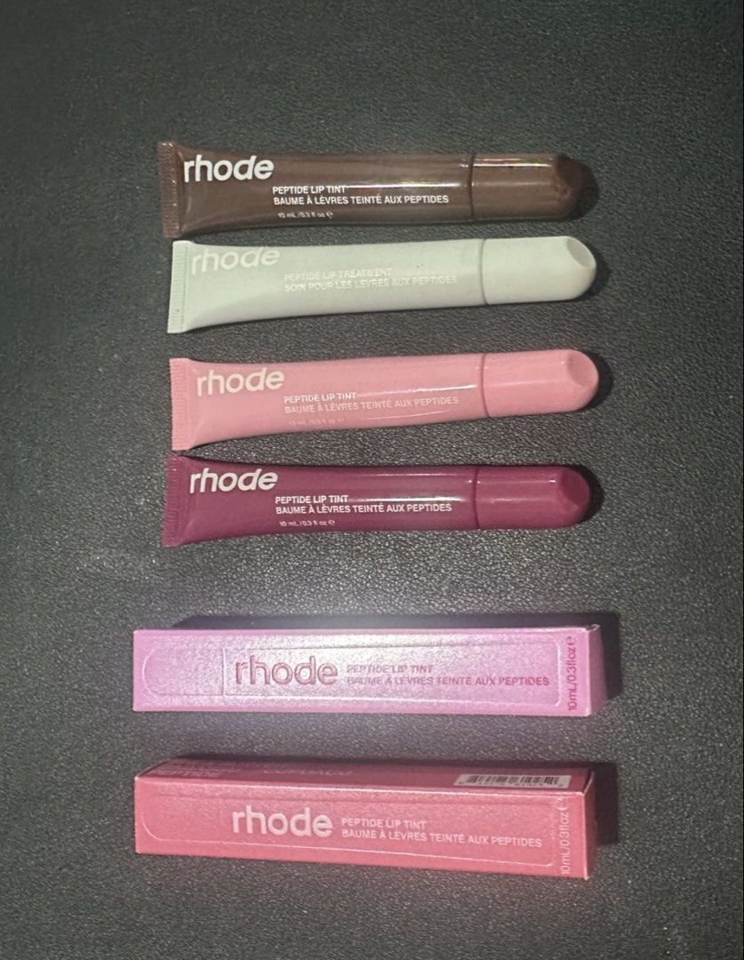 Rhode Peptide Lip Tint & Treatment - Various Shades (Category: Makeup) located in Quezon City. Submitted by mystash2.o (Listing ID 1446278769, Image 1). Description: - Rhode Peptide Lip Tints & Lip Treatment available. - Shades: Raspberry Jelly, Sugar Cookie, Jelly Bean (Tints). - Lip Treatment is unscented. - All are full-sized tubes. - Ideal for everyday wear or a subtle pop of color. - Mix and match your favorites or try the collection! With b