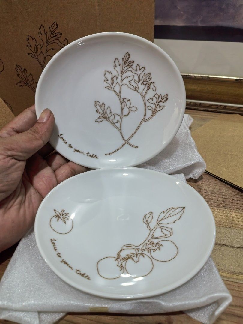 Saucer Pair - FANCL Novelty Collection (Category: Other Kitchenware & Tableware) located in Cebu City. Submitted by dudes_villanueva (Listing ID 1446317344, Image 1). Description: White Porcelain Plate FANCL 30th Anniversary "Love to your table" novelty collection. Brand New in Box 2 Suacer plates inside.