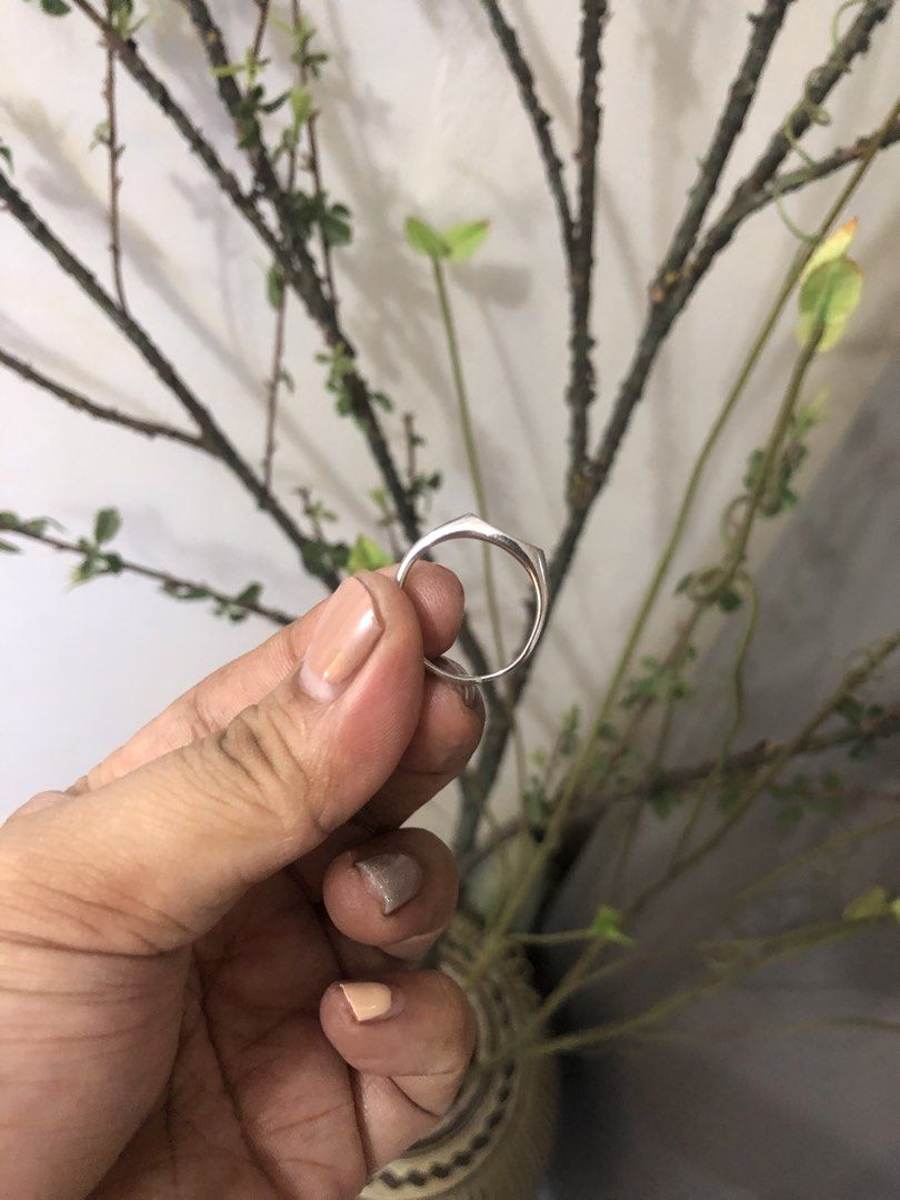 Seek Shine Silver ring adjustable 925 unisex (Category: Jewelry) located in Lucena. Submitted by kweenritz (Listing ID 1446170124, Image 2). Description: Hi. Selling this 925 ring from seek shine SM north edsa branch. Unisex. Adjustable from size 7 to 9. Approx 2.4 grams.. ( see photo with markings at the back) Good as new. With box and orig pouch.Orig price is 899. Used just once during photoshoot. Selling low 300 only plus shipping fee .