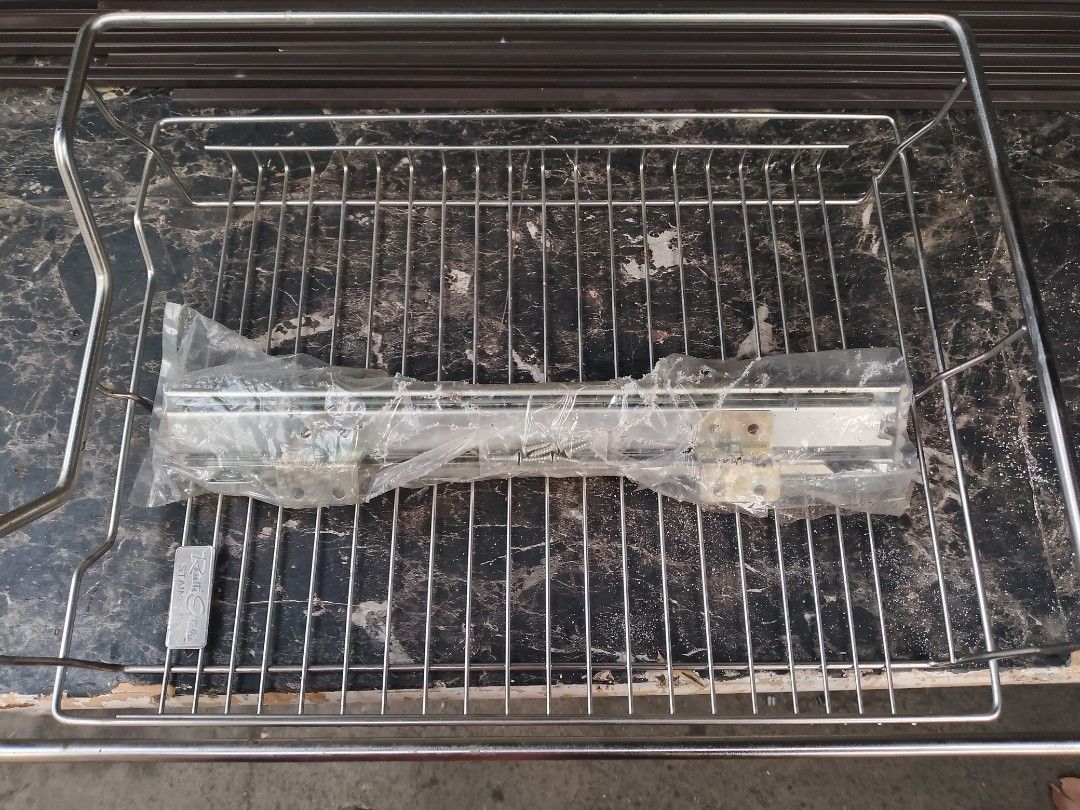 Stainless Steel Dish Rack with Sliding Drawer (Category: Shelves, Cabinets & Racks) located in Paranaque City. Submitted by drespere (Listing ID 1446224413, Image 3). Description: - Sturdy stainless steel construction - Features a convenient sliding drawer - Perfect for organizing kitchenware - Ready for its new home!.