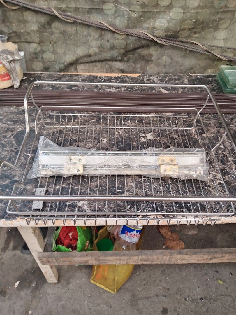 Stainless Steel Dish Rack with Sliding Drawer (Category: Shelves, Cabinets & Racks) located in Paranaque City. Submitted by drespere (Listing ID 1446224413, Image 2). Description: - Sturdy stainless steel construction - Features a convenient sliding drawer - Perfect for organizing kitchenware - Ready for its new home!.