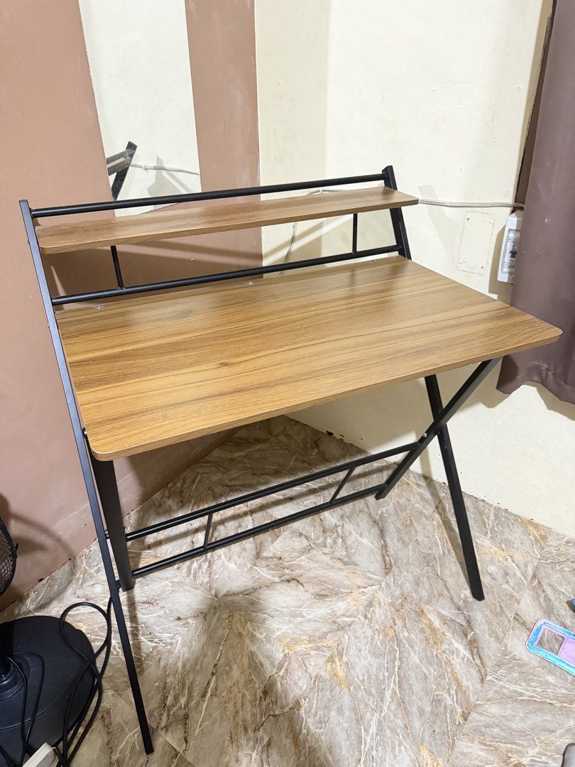 Study Table (Category: Office Furniture & Fixtures) located in San Juan City. Submitted by camyoo (Listing ID 1446309870, Image 1). Description: No flaws Foldable Without box 34inches w 44inches l.