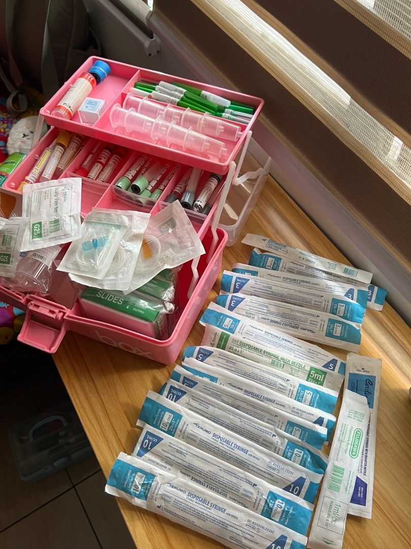 Tackle Box with Assorted Medical Supplies (Category: Medical Supplies & Tools) located in Manila. Submitted by matchalant (Listing ID 1446294723, Image 3). Description: - Pink tool box organizer - Contains medical supplies: syringes, needles, gauze, slides, specimen containers - All items neatly organized in compartments - Some items are still sealed mop: gcash mod: lalamove or meet up Location: Taft.