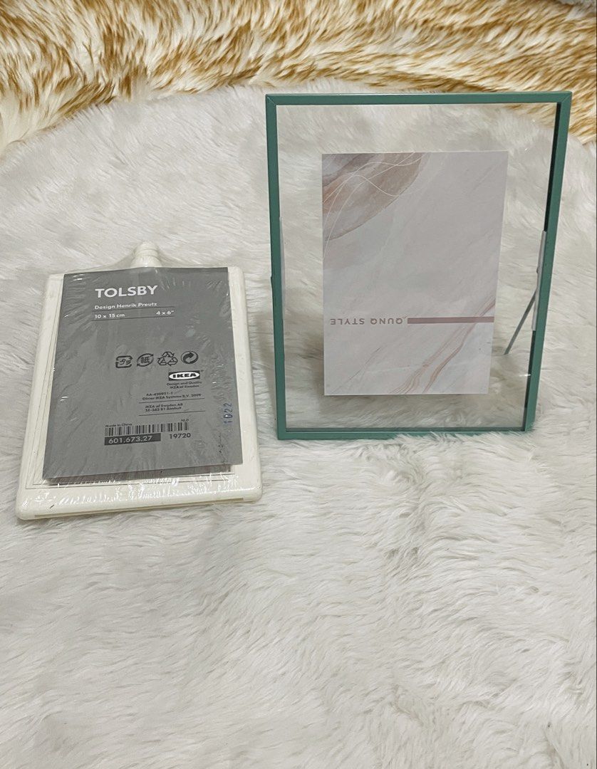 Take all 2pcs unused photo frames (Category: Frames & Pictures) located in Quezon City. Submitted by sissymissy1527 (Listing ID 1446178999, Image 1). Description: Ikea picture frame - 4x6 inches Qunq style Picture frame-5.5x7 inches.
