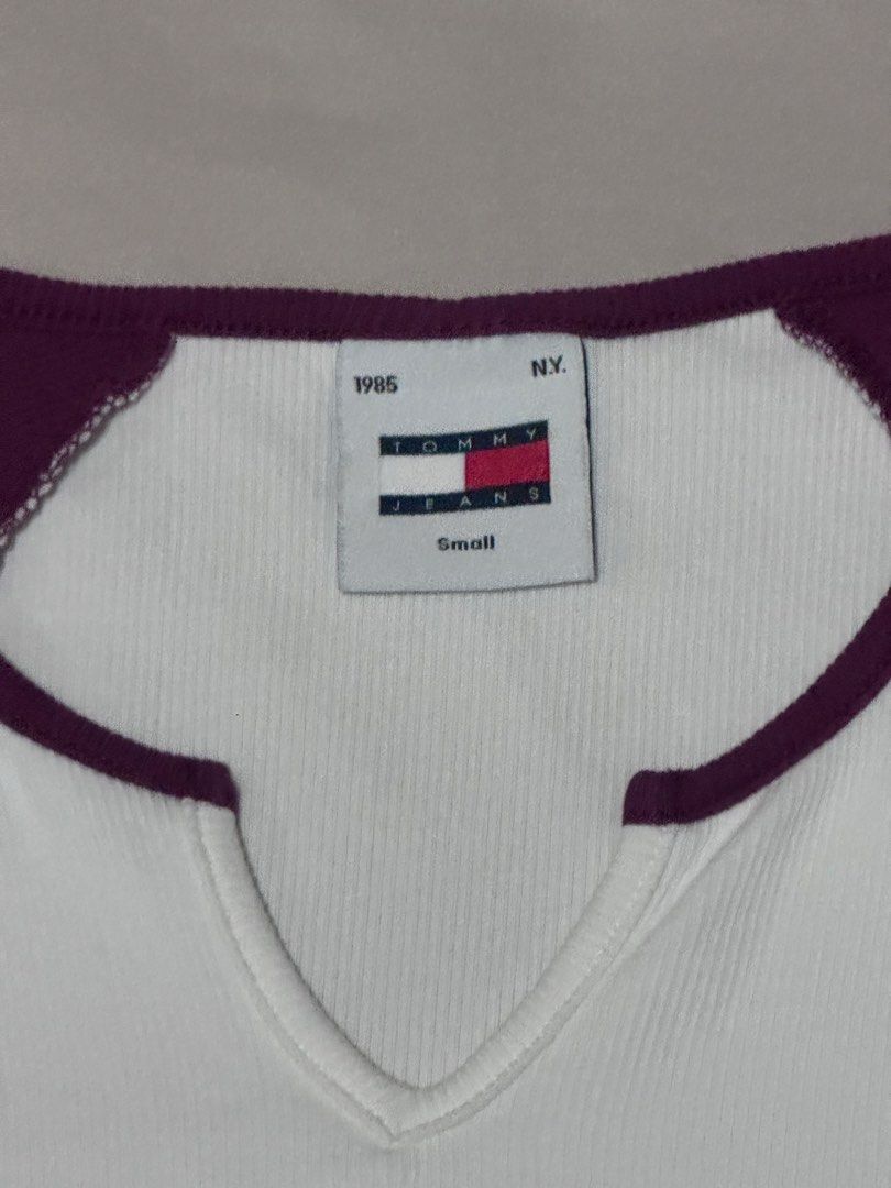 Tommy Jeans Graphic T-shirt (Category: Others Tops) located in Marikina City. Submitted by rozes22 (Listing ID 1446236734, Image 2). Description: - Brand: Tommy Jeans - Color: White and Maroon - Style: Raglan sleeve t-shirt - Texture: Ribbed - Size: Tagged Small (S) - Can fit small to medium.
