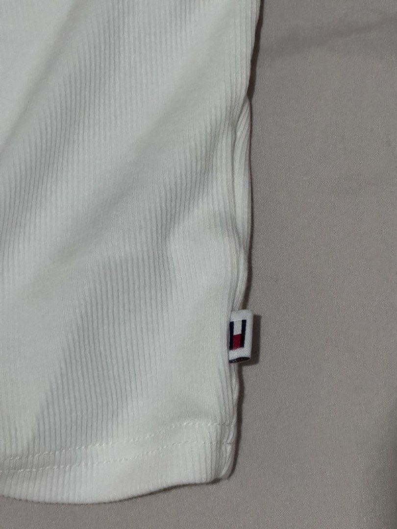 Tommy Jeans Graphic T-shirt (Category: Others Tops) located in Marikina City. Submitted by rozes22 (Listing ID 1446236734, Image 3). Description: - Brand: Tommy Jeans - Color: White and Maroon - Style: Raglan sleeve t-shirt - Texture: Ribbed - Size: Tagged Small (S) - Can fit small to medium.