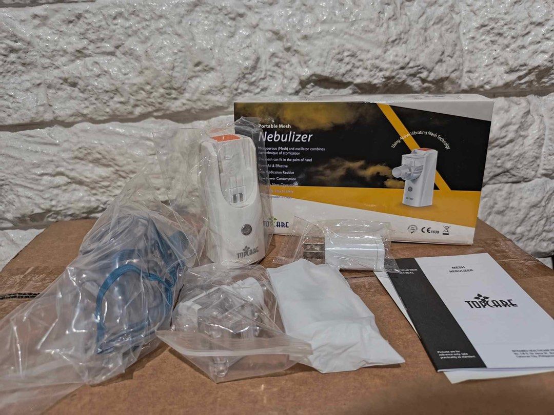 TOPCARE Portable Mesh Nebulizer (Category: Medical Supplies & Tools) located in Manila. Submitted by rosel2001 (Listing ID 1446176877, Image 1). Description: - Portable mesh nebulizer - Uses vibrating mesh technology - Comes with mask and accessories - Compact and easy to use - Ideal for on-the-go relief.