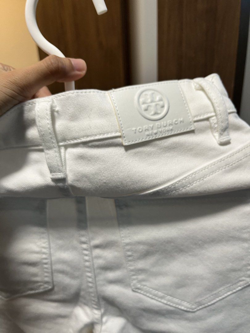 Tory Burch White Button Fly Jeans Size 25 (Category: Jeans) located in Quezon City. Submitted by classychicph92 (Listing ID 1446267894, Image 3). Description: - Brand: Tory Burch - Color: White - Style: High-waisted jeans - Closure: Button fly - Details: Gold-tone buttons - Size: 25-26waist - Origin: Made in China - Versatility: Perfect for dressing up or down.