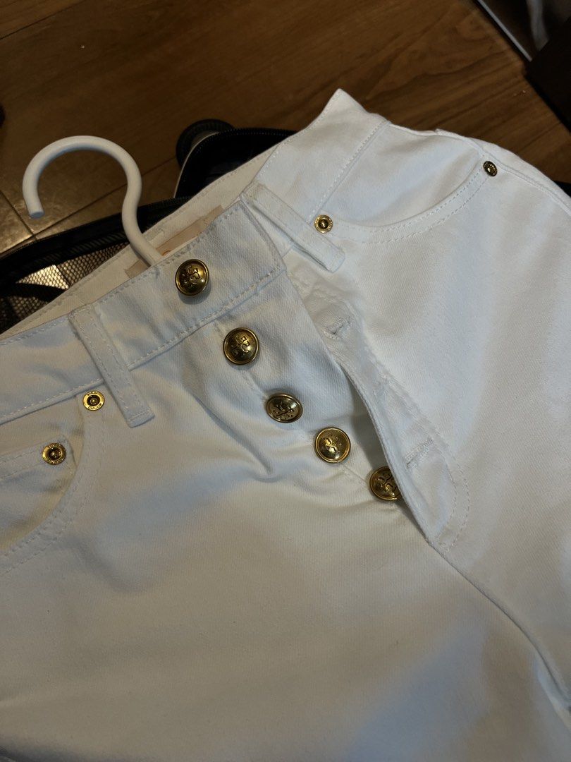 Tory Burch White Button Fly Jeans Size 25 (Category: Jeans) located in Quezon City. Submitted by classychicph92 (Listing ID 1446267894, Image 2). Description: - Brand: Tory Burch - Color: White - Style: High-waisted jeans - Closure: Button fly - Details: Gold-tone buttons - Size: 25-26waist - Origin: Made in China - Versatility: Perfect for dressing up or down.