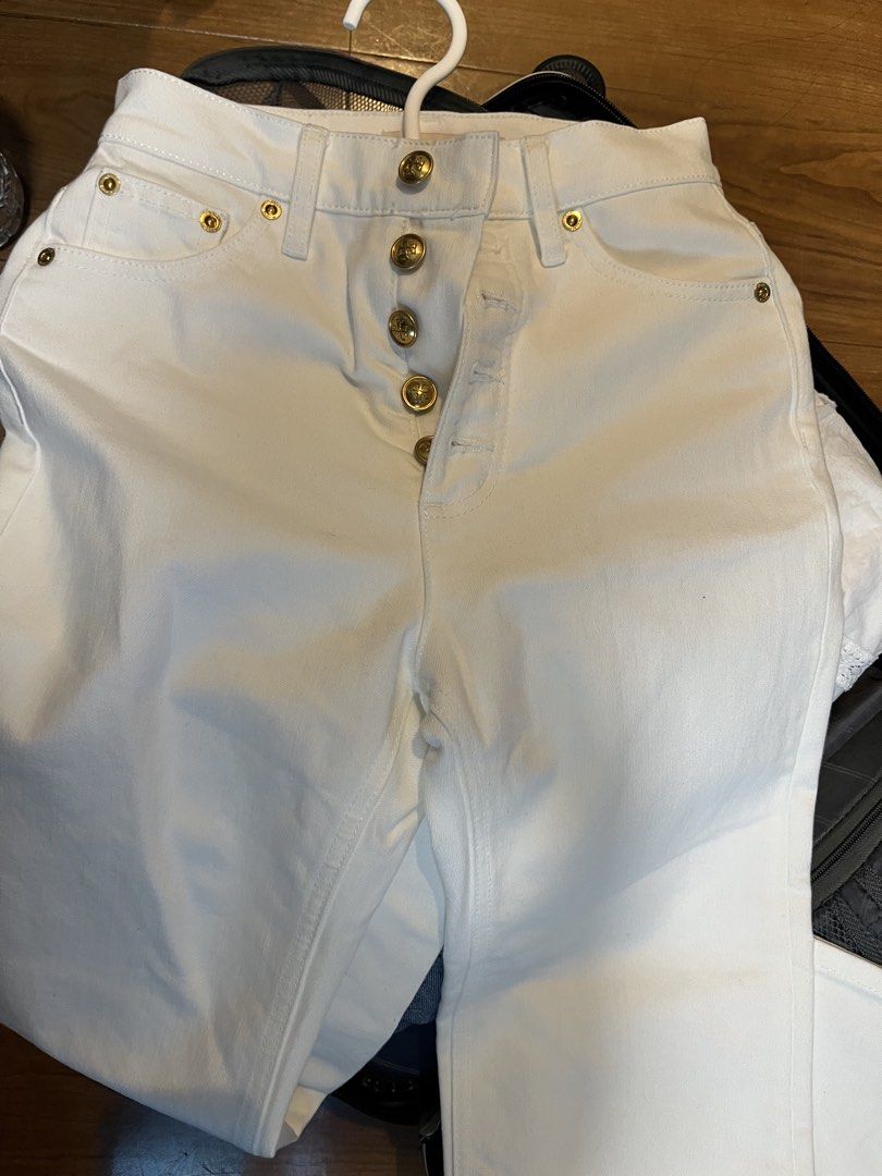 Tory Burch White Button Fly Jeans Size 25 (Category: Jeans) located in Quezon City. Submitted by classychicph92 (Listing ID 1446267894, Image 1). Description: - Brand: Tory Burch - Color: White - Style: High-waisted jeans - Closure: Button fly - Details: Gold-tone buttons - Size: 25-26waist - Origin: Made in China - Versatility: Perfect for dressing up or down.