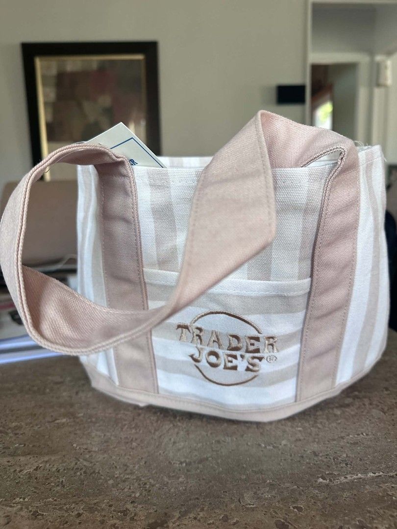Trader Joe's Striped Tote Bag - Multiple Colors Available (Category: Tote Bags) located in Manila. Submitted by cyj08 (Listing ID 1446181075, Image 3). Description: :: 👜 AUTHENTIC TRADER JOE'S MINI CANVAS TOTE BAGS 👜 ✨ Arriving July 3 ✨ 🚨 PRE-ORDER NOW! 🚨 Authentic Trader Joe's Mini Canvas Tote Bags 💙 Blue | 🩷 Pink | 🤎 Beige | 💚 Mint ✔ 100% Original ✔ Purchased directly from Trader Joe's USA ✔ Brand New with Tags ✔ Arriving July 3 ⚠️ Limi