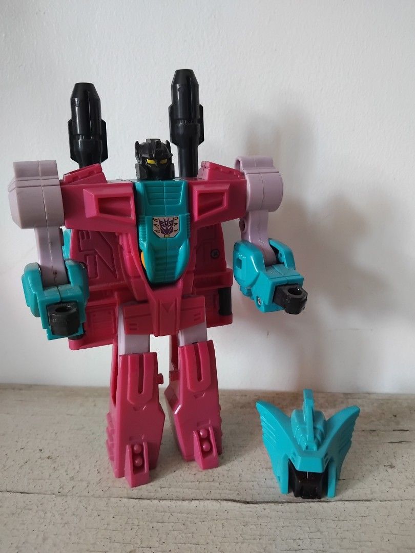 Transformers G1 Action Figures Lot (Category: Action & Battle Toys) located in San Fernando. Submitted by imlikeabird (Listing ID 1446198686, Image 2). Description: - Lot of 2 G1 Transformers action figures - Figure 1: Black and red, spider-bot design - Figure 2: Pink and teal with black cannons - Both are vintage G1 era figures - Perfect for collectors - Minor wear present on the pink figure nemesis Prime 3.5k seacon leader g1 4.5k jetfire 2k.