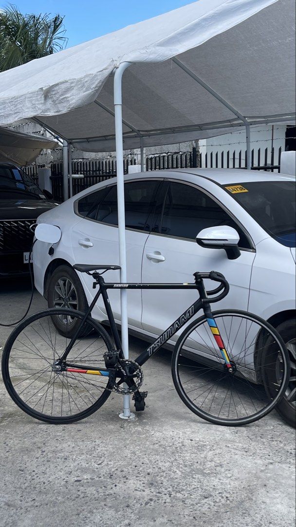 TSUNAMI SNM100 SIZE: LARGE FIXIE FIXED GEAR (Category: Bicycles) located in Davao. Submitted by matt_the03 (Listing ID 1446247901, Image 1). Description: Already in lowest price. Specs: Fixed and Freewheel available Frameset • Tsunami SNM100 size 54 • Aluminum alloy Cockpit • Truvativ stem 90mm • UNO Dropbar Saddle Area • Black Saddle • 777 alloy seatpost 27.2 Drivetrain • Skeace crankset 49T square taper • Peanut chain • 17T fixed cog • 18T free