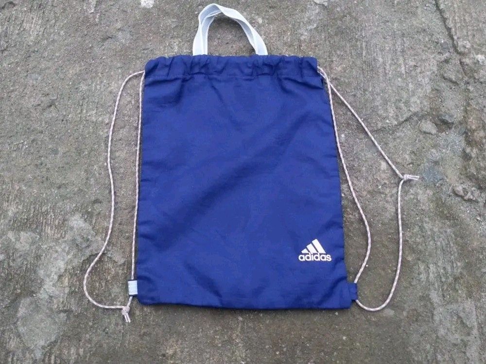 Vintage Adidas drawstring bag (Category: Backpacks) located in Guiguinto. Submitted by selected_3rp (Listing ID 1446213216, Image 1). Description: vintage drawstring bag no issue pm.