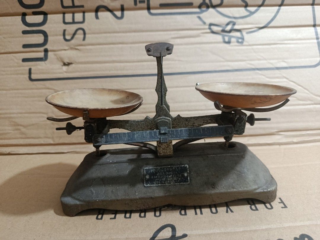 Vintage Cast Iron Double Beam Balance Scale (Category: Vintage Collectibles) located in Quezon City. Submitted by truephoenix.16cee3 (Listing ID 1446332397, Image 2). Description: ​For Sale: Authentic Vintage Double Pan Balance Scale Perfect for vintage collectors, antique enthusiasts, or anyone looking to add a unique rustic/industrial touch to their home, cafe, studio, or office setup. It looks great displayed on a bookshelf or desk! Location: 