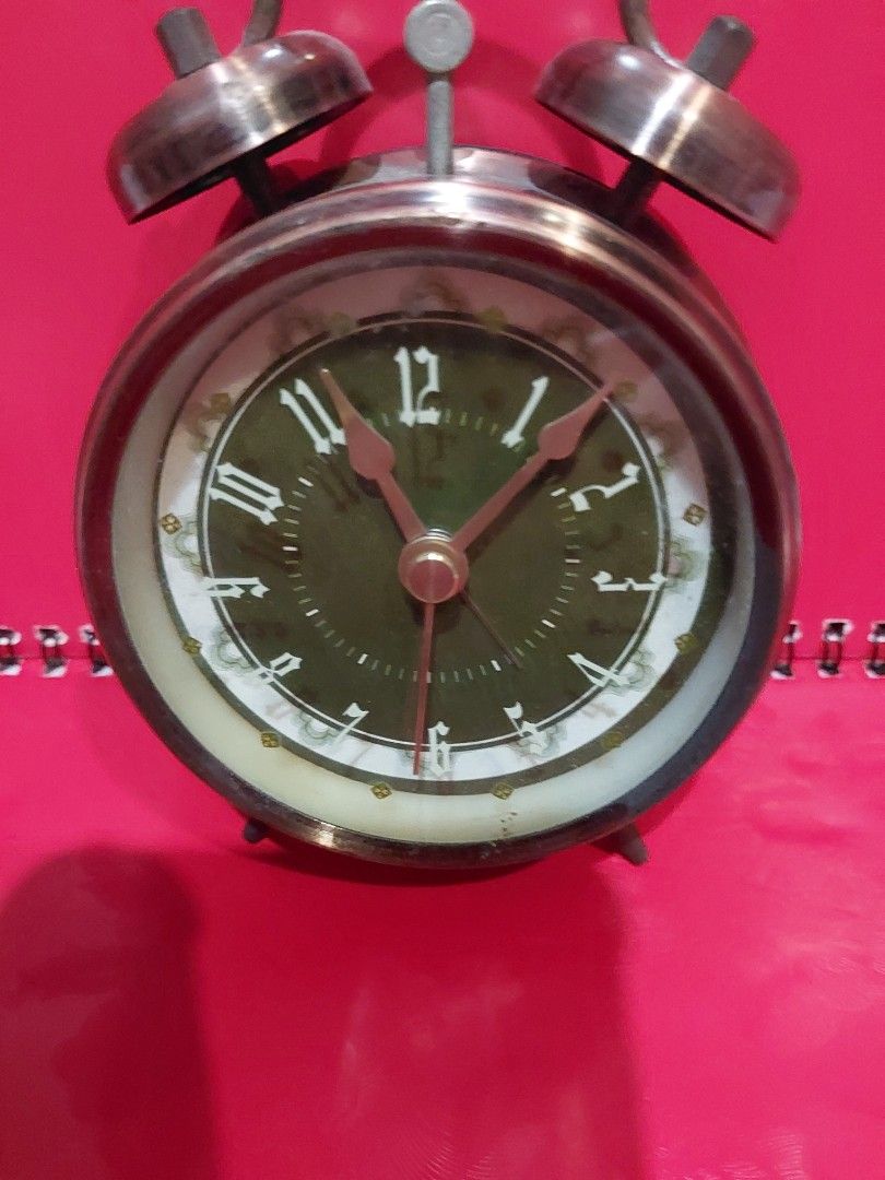 Vintage Twin Bell Alarm Clock (Category: Clocks) located in Manila. Submitted by bryantoyshop (Listing ID 1446294242, Image 2). Description: ala3m not working but good condition - Classic retro twin bell alarm clock - Features an analog face with Roman numerals - Durable metal casing with a vintage aesthetic - Wind-up mechanism, no batteries required - Ideal for bedside tables, decor, or vintage collectors.