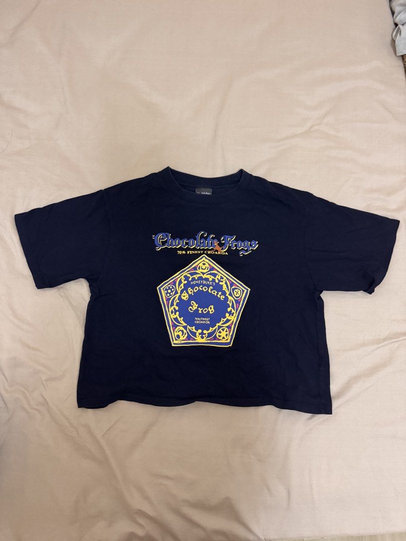 WIZARDING WORLD HARRY POTTER TOP chocolate frog (Category: Shirts) located in Manila. Submitted by rianbfr (Listing ID 1446297377, Image 1). Description: bought from universal studios JAPAN, wizarding world harry potter top. rarely worn, no tears, stains, vibrant print, no cracks..