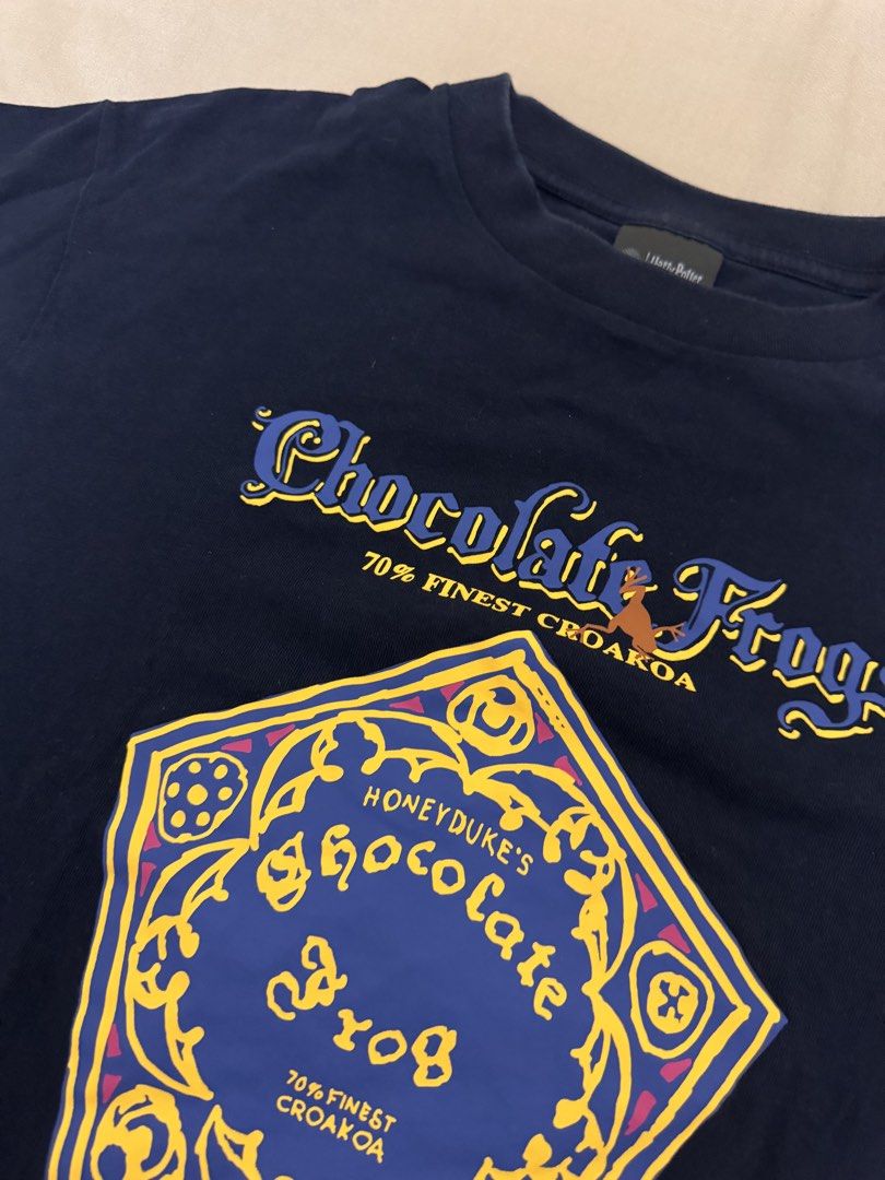 WIZARDING WORLD HARRY POTTER TOP chocolate frog (Category: Shirts) located in Manila. Submitted by rianbfr (Listing ID 1446297377, Image 2). Description: bought from universal studios JAPAN, wizarding world harry potter top. rarely worn, no tears, stains, vibrant print, no cracks..