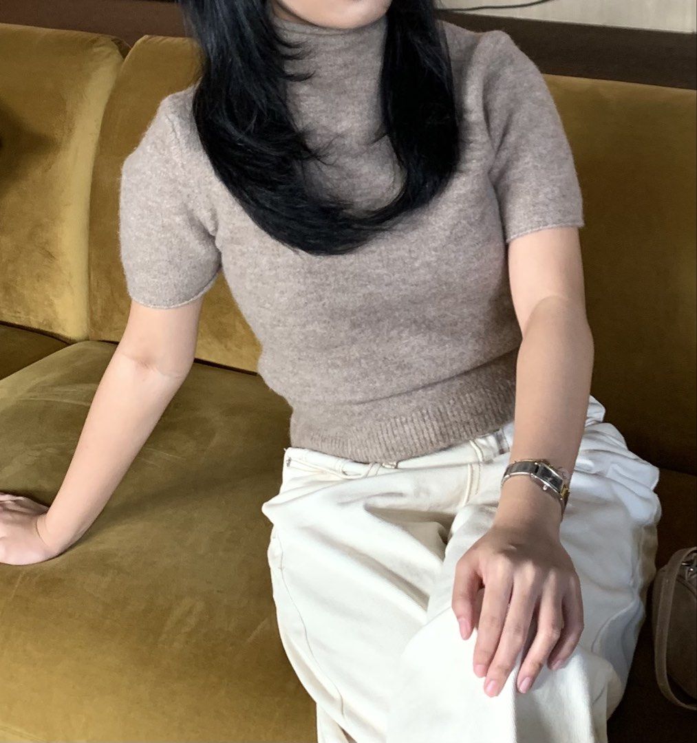 Zara Knit Top (Category: Others Tops) located in Marikina City. Submitted by pilloaf (Listing ID 1446286267, Image 3). Description: - Plain knit jumper with a high neck and short sleeves - In Light Mink color - Fits XS-S frames.