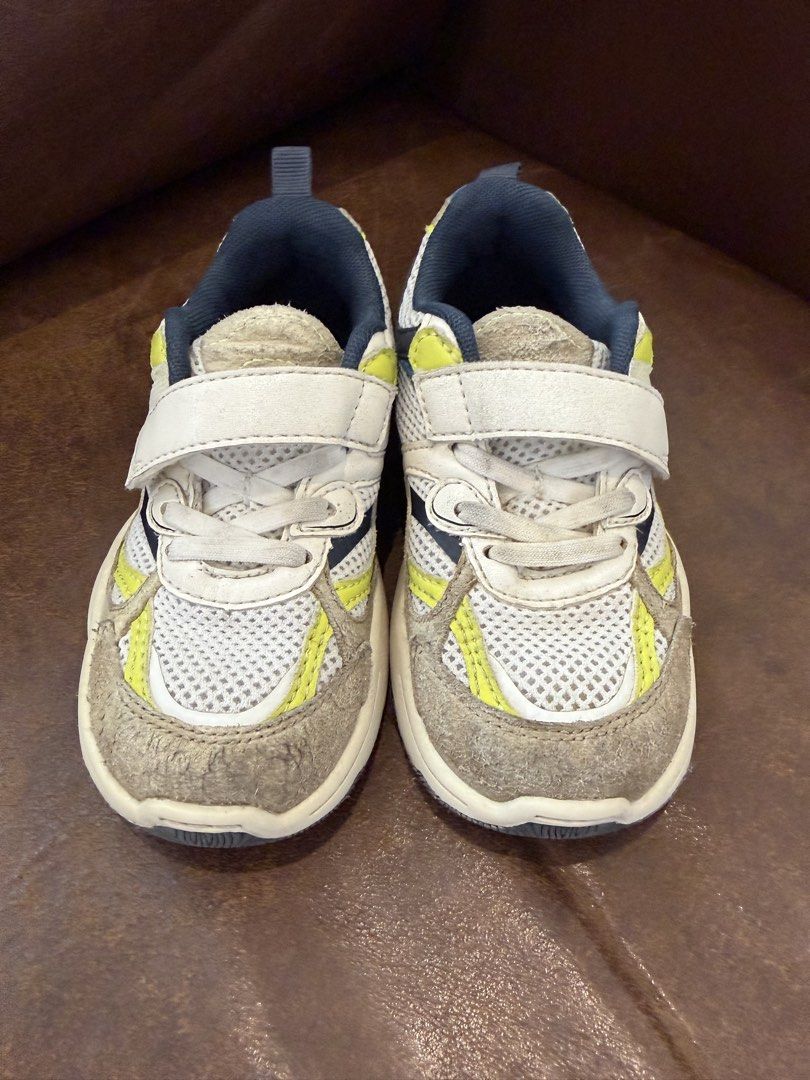 Zara Toddler Sneakers size 25 (Category: Babies & Kids Fashion) located in Quezon City. Submitted by zelev (Listing ID 1446196382, Image 2). Description: Bought from Zara website - White mesh kids' sneakers - Grey and blue overlay details - Bright yellow accent colors - Easy velcro strap closure (no need to tie) - Convenient pull tab at the back - Ideal for everyday wear and active play Toddler Size 25 No payment, no reservation..