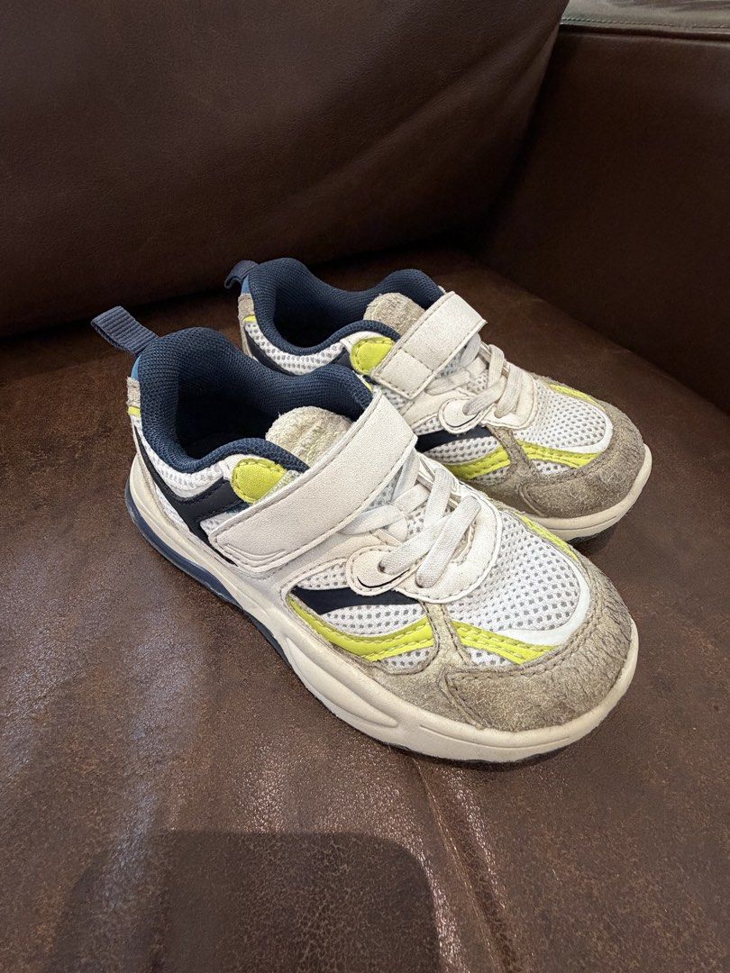 Zara Toddler Sneakers size 25 (Category: Babies & Kids Fashion) located in Quezon City. Submitted by zelev (Listing ID 1446196382, Image 3). Description: Bought from Zara website - White mesh kids' sneakers - Grey and blue overlay details - Bright yellow accent colors - Easy velcro strap closure (no need to tie) - Convenient pull tab at the back - Ideal for everyday wear and active play Toddler Size 25 No payment, no reservation..