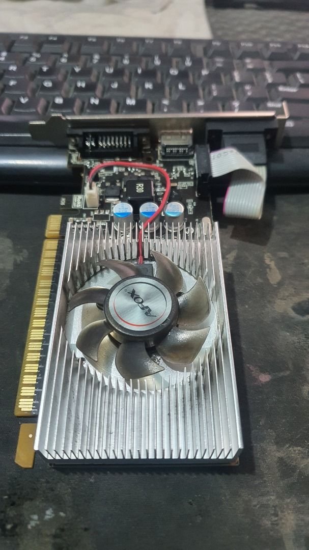 AFOX GT730 2GB DDR3 Graphics Card (Category: Computer Parts) located in Caloocan City. Submitted by grandwolf-f664b0 (Listing ID 1446407998, Image 3). Description: - AFOX GT730 Graphics Card - 2GB DDR3 Memory - Outputs: DVI, VGA, HDMI - Ideal for PC upgrades or budget builds - Tested and confirmed working - Selling due to system upgrade.