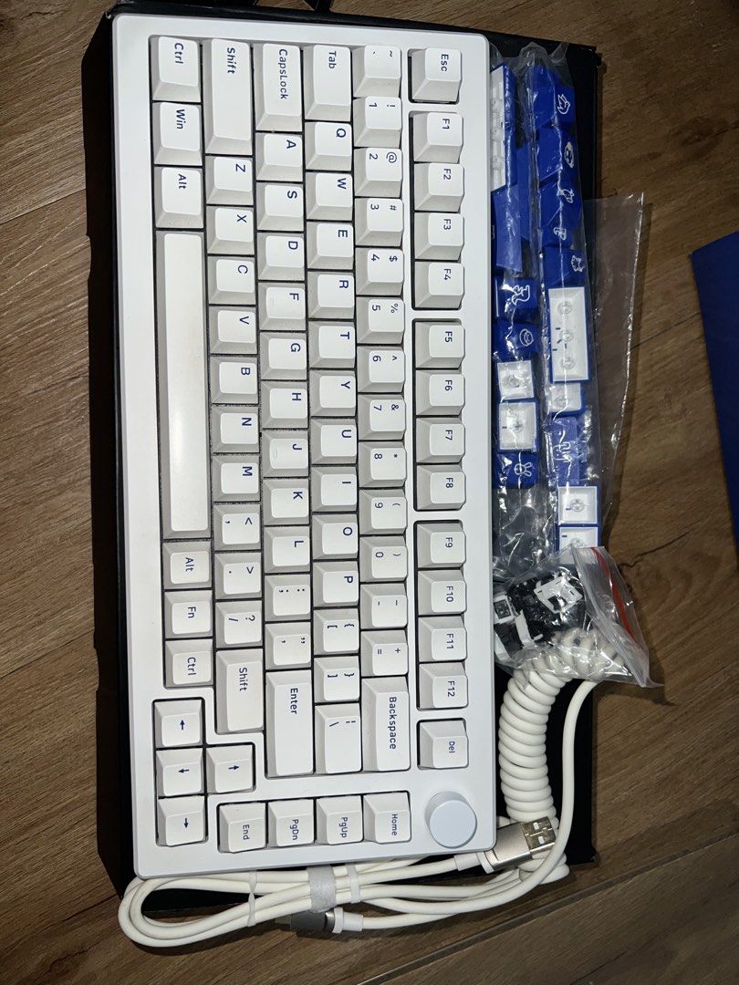 Akko MOD007 Multi-mode Keyboard Blue On White (Category: Computer Keyboard) located in Quezon City. Submitted by qojovaaa26240 (Listing ID 1446384972, Image 2). Description: - Akko MOD007 Keyboard - Color: Blue On White - Multi-mode connectivity - Includes coiled USB-C cable - Comes with extra keycaps - Convenient side knob - Ideal for gaming and typing.