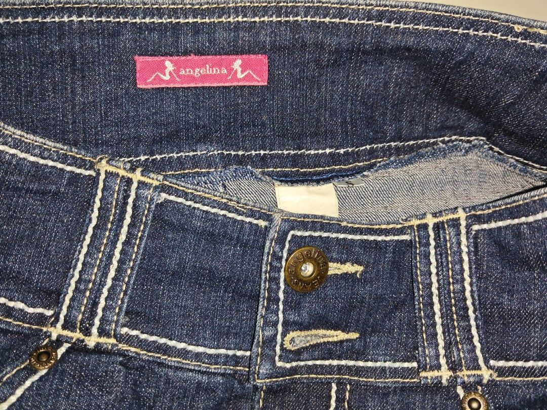 ANGELINA BLUE DENIM MINI SKIRT (Category: Skirts) located in Cheras. Submitted by chempakazz (Listing ID 1446471605, Image 2). Description: - Cute blue denim mini skirt from Angelina - Classic five-pocket style - Contrast stitching detail - Button and zip closure - Versatile for pairing with t-shirts or blouses - Ideal for fun casual outings - price negotiable.