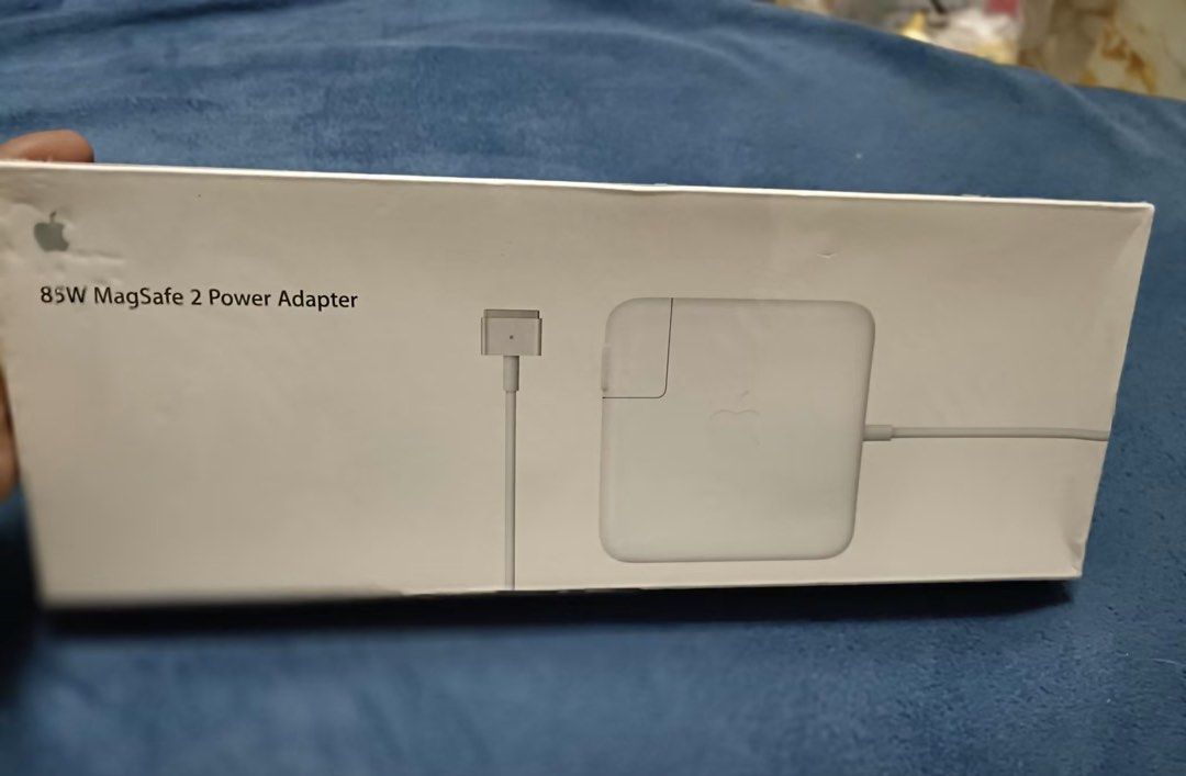 Apple 85W MagSafe 2 Power Adapter (Category: Chargers & Cables) located in Baguio. Submitted by beygyuu (Listing ID 1446506004, Image 1). Description: - Original Apple 85W MagSafe 2 Power Adapter - Specifically designed for compatible MacBook models - Ensures reliable and efficient charging - Essential power source for your device -working.
