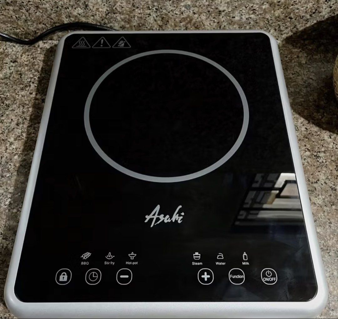 Asahi Induction Cooker - Multi-function (Category: Cookers) located in Lipa City. Submitted by lialoves (Listing ID 1446358944, Image 1). Description: - Asahi Induction Cooker - Multiple Cooking Functions: BBQ, Stir Fry, Hot Pot, Steam, Water, Milk - Simple and Easy to Use Controls - Compact and Portable Design - Ideal for Small Kitchens, Dorm Rooms, or Apartments - In excellent working condition.