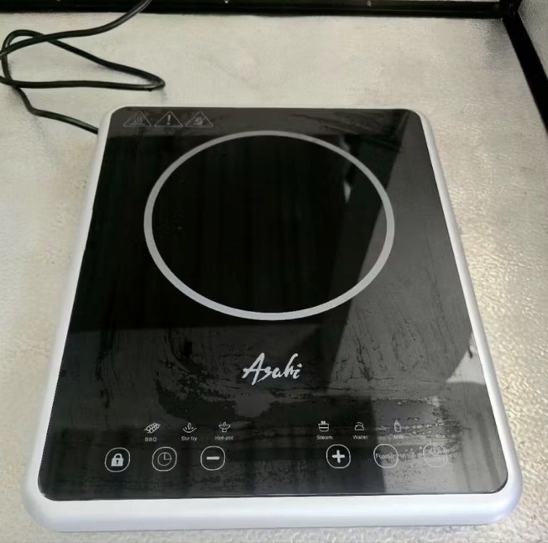 Asahi Induction Cooker - Multi-function (Category: Cookers) located in Lipa City. Submitted by lialoves (Listing ID 1446358944, Image 2). Description: - Asahi Induction Cooker - Multiple Cooking Functions: BBQ, Stir Fry, Hot Pot, Steam, Water, Milk - Simple and Easy to Use Controls - Compact and Portable Design - Ideal for Small Kitchens, Dorm Rooms, or Apartments - In excellent working condition.