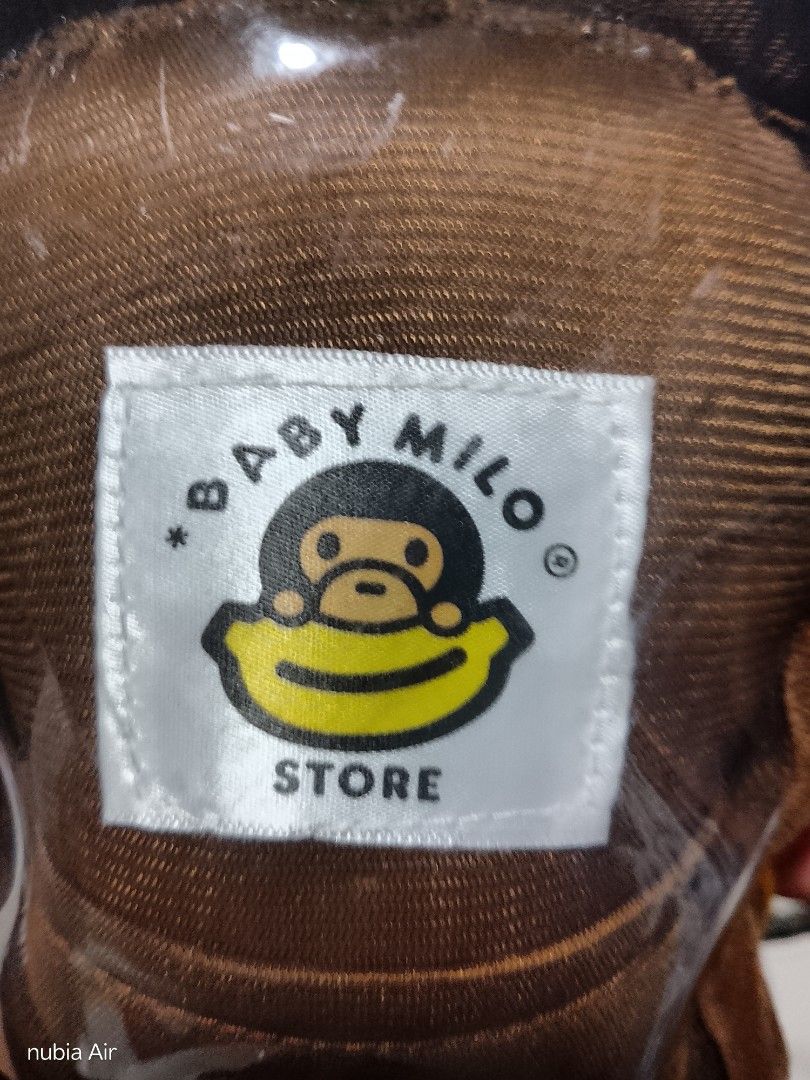 Bape Baby Milo Store Devil Monkey Plush Toy (Category: Plushies & Soft Toys) located in Quezon City. Submitted by nothingn1c3 (Listing ID 1446527864, Image 2). Description: - Cute devil monkey plush from Baby Milo Store. - Features brown fur with red wings and horns. - Yellow face and orange feet. - Original Baby Milo tag is attached. - Ideal for Baby Milo collectors and fans. - A fun and unique collectible item..