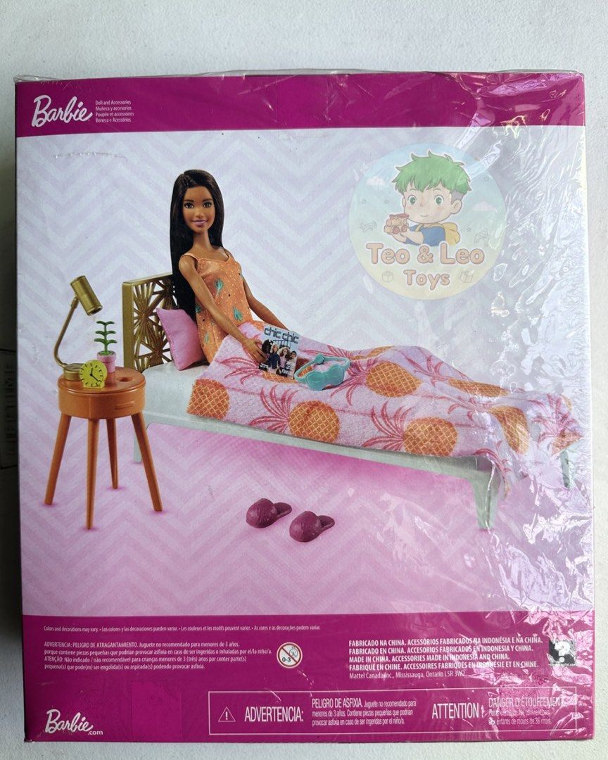 Barbie Bed and Nightstand Playset with Doll (Category: Kids Toys) located in Quezon City. Submitted by tandltoys (Listing ID 1446532141, Image 3). Description: - NRFB Barbie Doll and Bedroom Furniture Playset (model GRG86), featuring a doll in a patterned dress with pineapple-print bedding.The set includes a white bed frame, a pink blanket and pillow, a nightstand, and five themed accessories. - Japanese Variation What you see is what you get. MO