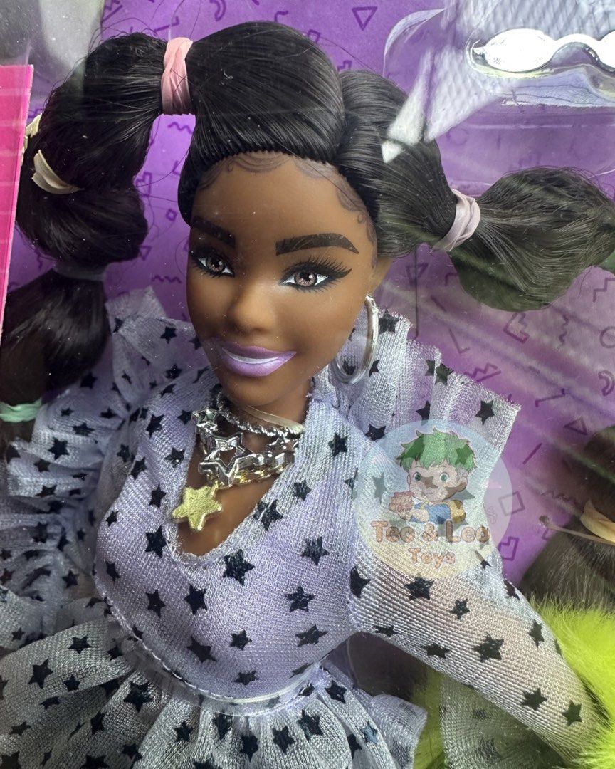 Barbie Extra Doll #7 with Styling Pieces (Category: Kids Toys) located in Quezon City. Submitted by tandltoys (Listing ID 1446532049, Image 1). Description: NRFB Barbie Extra doll, # 7. Comes with 15 styling pieces and accessories. Doll has dark skin and black hair in pigtails. She wears a star-print dress and silver boots. Includes a fluffy neon green boa and a small dog. Box is not in good condition as pictures so manage your expectation, but d
