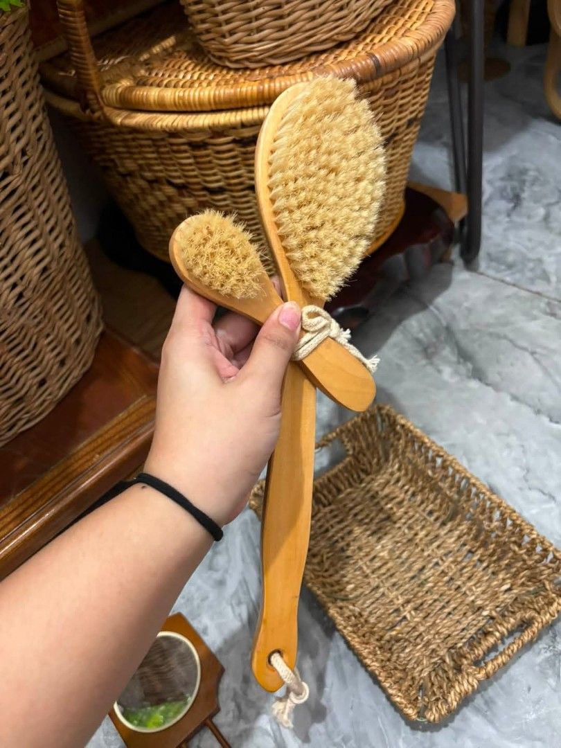 Bathroom set of 4 (Japan items) (Category: Makeup) located in Cavite. Submitted by l1ttlelulu (Listing ID 1446497435, Image 2). Description: - Set includes two wooden bath brushes (one large, one small). - Comes with a rectangular woven basket. - Natural wood finish on brushes. - Basket is a neutral tan color. - Perfect for bathroom organization or spa display..