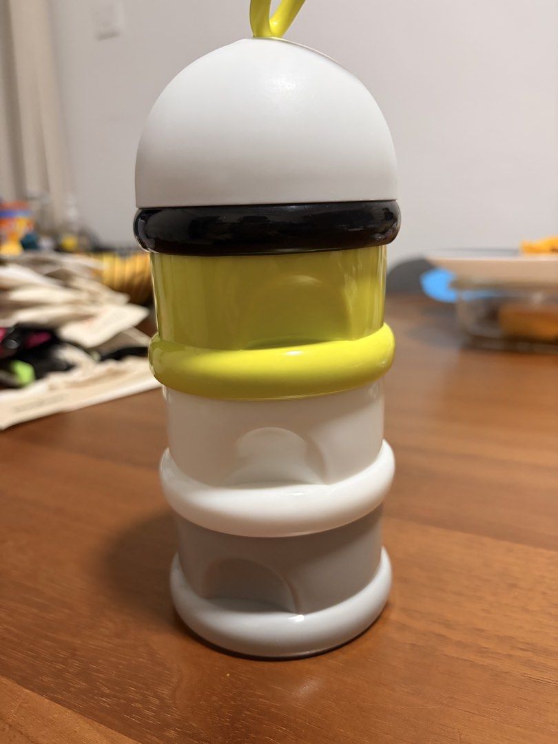 BEABA Stackable Formula Dispenser (Category: Breastfeeding & Bottle Feeding) located in Singapore. Submitted by tintey (Listing ID 1446468430, Image 2). Description: - BEABA Stackable Formula Dispenser - 3 separate compartments for formula - Secure twist-together design - Lid with convenient carrying loop - Ideal for on-the-go feeding .