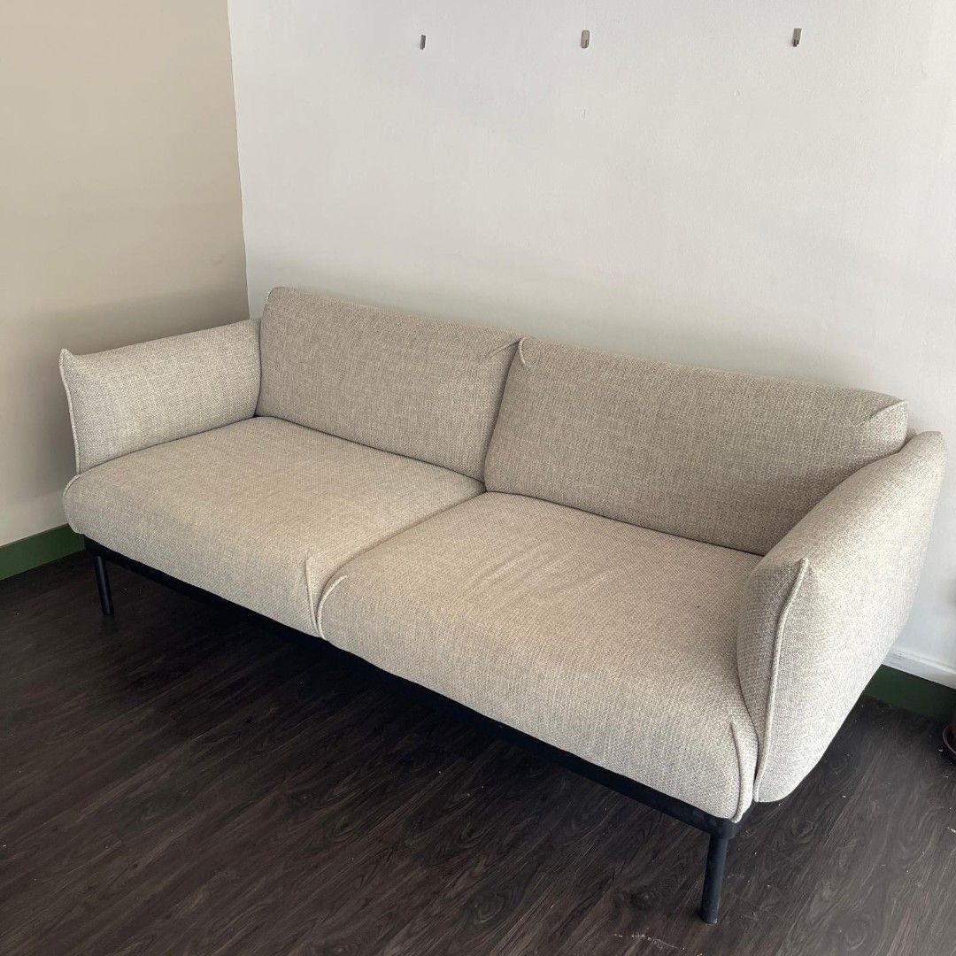 Beige Sofa (Category: Sofas) located in Singapore. Submitted by clshop (Listing ID 1446524923, Image 1). Description: Fabric Sofa For Sale $399 Retail $999 Dimensions L220 X D85 X H 72.5 cm 2 seater but cam fit 3 person easily - Modern design with black metal legs - Textured and durable fabric - Ample seating space, great for living rooms - Seat depth: 61cm.