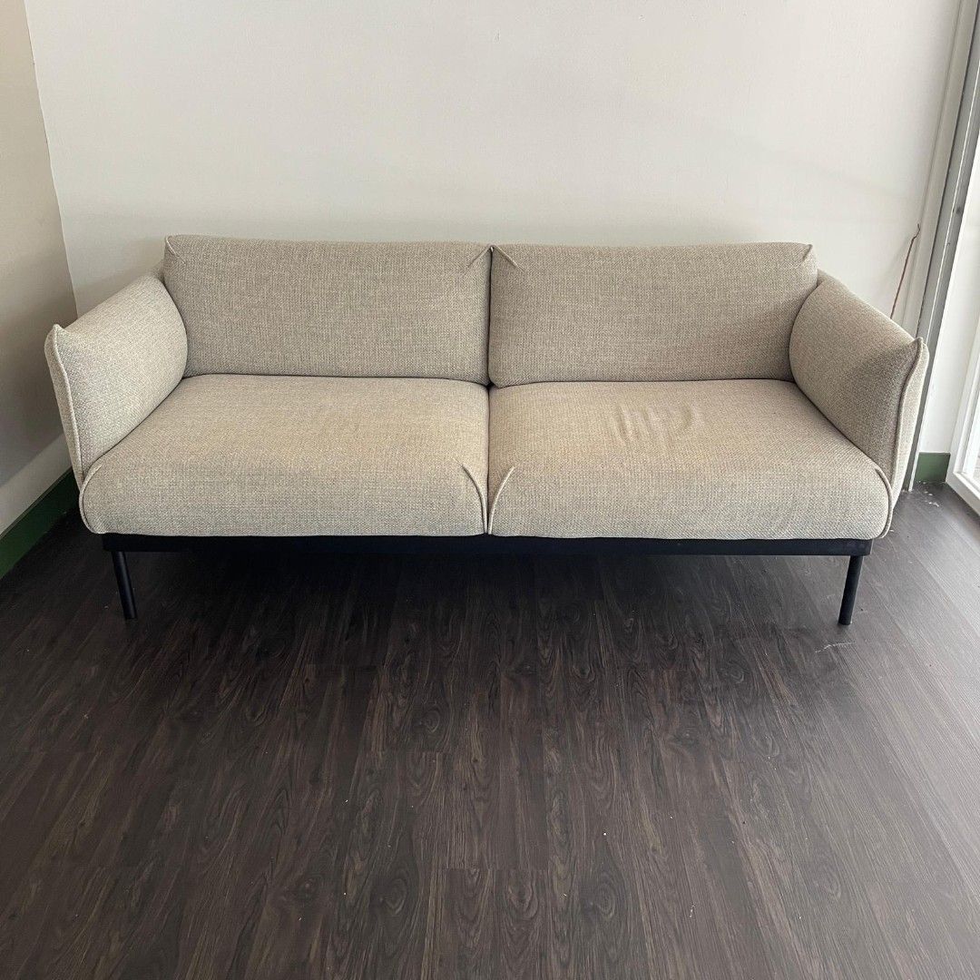 Beige Sofa (Category: Sofas) located in Singapore. Submitted by clshop (Listing ID 1446524923, Image 2). Description: Fabric Sofa For Sale $399 Retail $999 Dimensions L220 X D85 X H 72.5 cm 2 seater but cam fit 3 person easily - Modern design with black metal legs - Textured and durable fabric - Ample seating space, great for living rooms - Seat depth: 61cm.