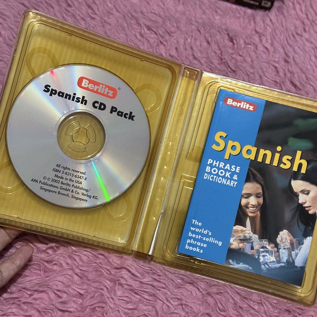 Berlitz Spanish Travel Pack CD Edition Phrase Book & Dictionary (Category: Textbooks) located in Las Pinas. Submitted by thestylecapital (Listing ID 1446359840, Image 3). Description: - Berlitz Travel Pack for learning Spanish - Includes 224-page phrase book and dictionary - Comes with an audio CD with 13 tracks - Covers over 1,200 words and phrases - Features pronunciation guides and emergency expressions - Ideal for travelers wanting to learn b