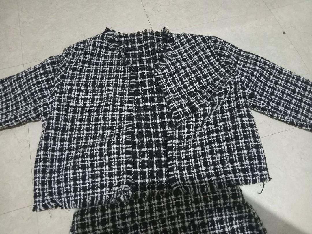 Black & White Plaid Tweed Jacket and Skirt Set (Category: Sets or Coordinates) located in Cavite. Submitted by dmprelovedclothes (Listing ID 1446366367, Image 3). Description: - Two-piece set: cropped jacket and ruffled hem skirt - Classic black and white plaid tweed pattern - Skirt features decorative pearl buttons on the front - Chic and classic style, perfect for dressing up Used onced (can pass as brandnew) 9/10 condition *Color may vary due 