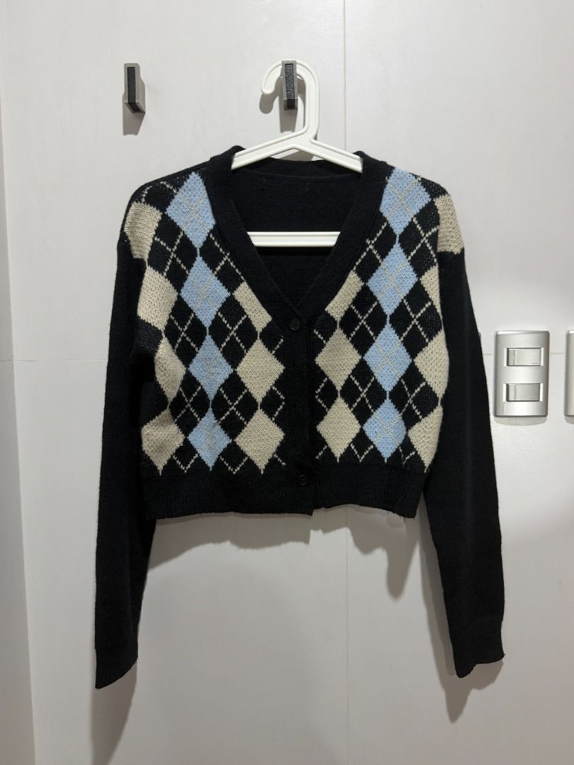 Black Argyle Cropped Cardigan (Category: Coats, Jackets and Outerwear) located in Mandaluyong City. Submitted by kayechx (Listing ID 1446496286, Image 1). Description: - Cute cropped cardigan - Black base with light blue and beige argyle pattern - V-neckline - Button closure - Easy to style for casual or dressed-up looks - price SLIGHTLY negotiable, but not by a lot huhu already selling cheap since i need closet space asap will give 10% discount 