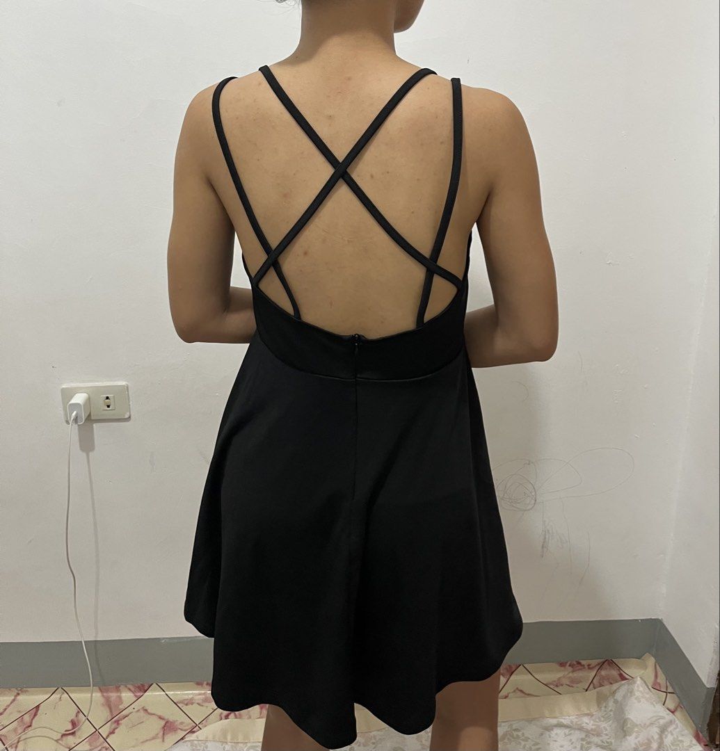 Black Criss-Cross Back Mini Dress (Category: Dresses) located in Manila. Submitted by jsantos_16 (Listing ID 1446378953, Image 3). Description: - Cute black mini dress - Criss-cross strap detail on the back - Perfect for parties or a night out - Versatile for dressing up or down RFS: Decluttering.
