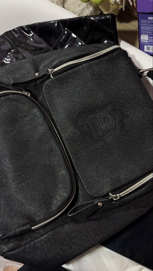 Black Faux Leather Backpack with Zipper Pockets (Category: Backpacks) located in Davao. Submitted by sammyang123 (Listing ID 1446451980, Image 3). Description: - Chic black backpack with a textured faux leather finish. 🎉🎉FREE SF‼️🚨 - Spacious main compartment for your essentials. - Convenient front zipper pocket for quick access. - Two additional side zipper pockets for extra storage. - Adjustable shoulder straps for a comfortable fit. - Sturd